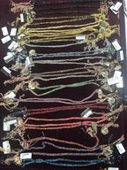 Bracciale in Seta Ed Argento con Ciondolo sul Finale