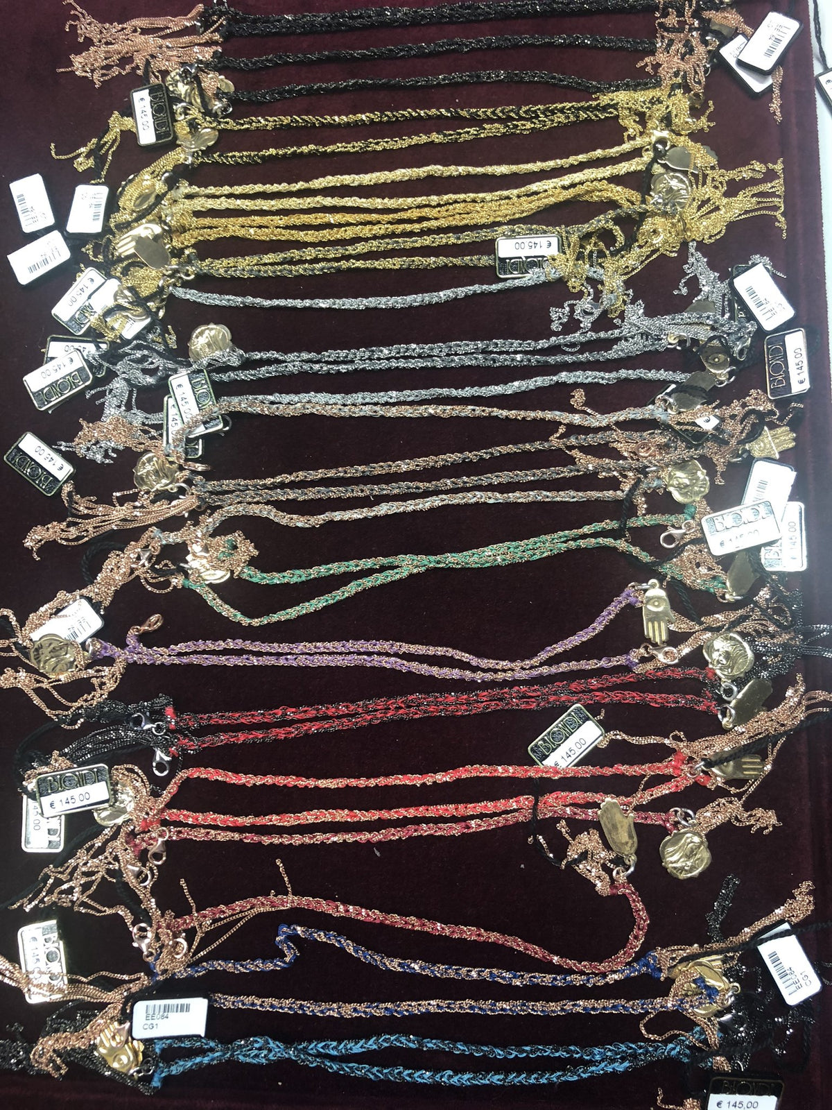 Bracciale in Seta Ed Argento con Ciondolo sul Finale