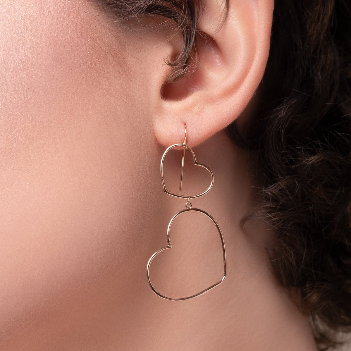 Orecchini Pendenti con Due Cuori